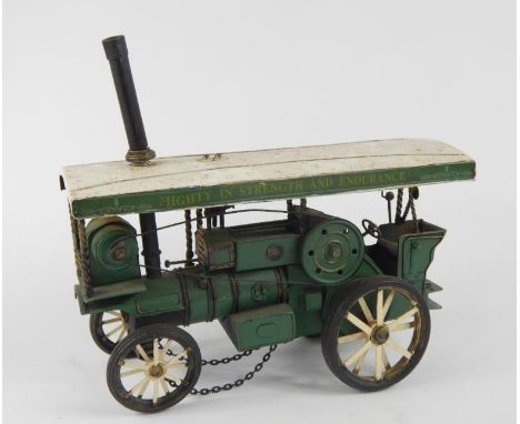 A scratch built Mamod style traction engine Mighty in Strength and Endurance, partially articulated, 34cm wide.