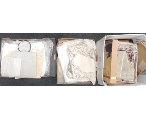 Linen and lace table linen, and a box of needlework and tapestry materials.