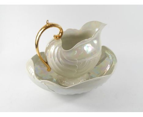 A Shelley pearl lustre pottery wash jug, and bowl of rococo shell form, printed marks.