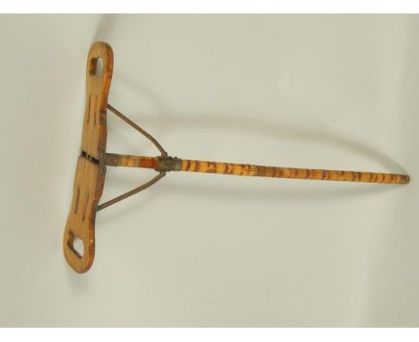 A late Victorian bamboo and beech wood folding shooting stick, lacks metal terminal to the point.