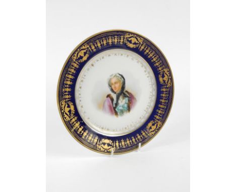 A Sevres porcelain 19thC plate painted with a portrait of Marie Leszeczynska, within bleu du roi and gilt border, Sevres 1844