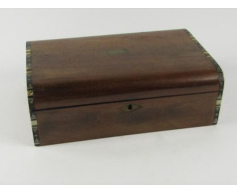 A Victorian domed walnut sewing box, with ebony, mother of pearl and ivory strap work, 26cm x 17.5cm x 8.5cm.