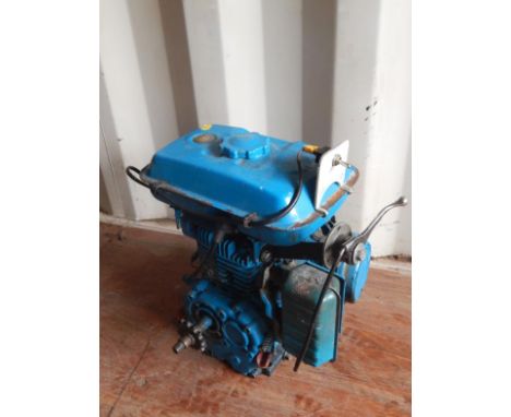 A 20thC motorised engine, possibly a starboard or boat motor, in blue.