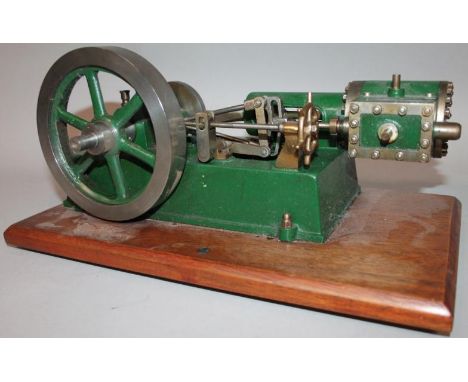 A Clarkson of York vintage mill type horizontal engine, in green, with articulated parts, with raised name stamp, on mahogany