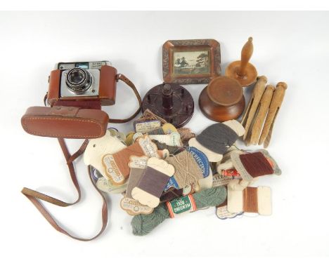 An Ilford Sportsman camera, Japanese antimony ashtray, Bakelite cotton spool and thimble and sundry sewing accoutrements.