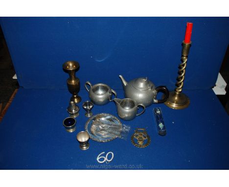A quantity of Brass and pewter including Abbey pewter teapot, milk jug and sugar bowl, brass spiral candlestick, egg cups, et