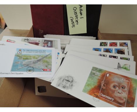 GUERNSEY COLLECTION OF APX 150 FIRST DAY COVERS IN ALBUMS &amp; LOOSE   3 albums full of first day covers along with large am