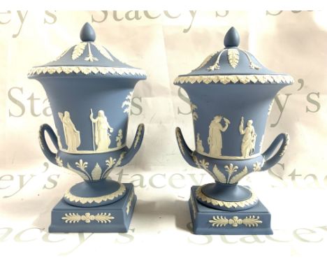 2 Wedgewood Jasperware urns and covers with classical scenes. 31cm/30cm. (68/84) (D)