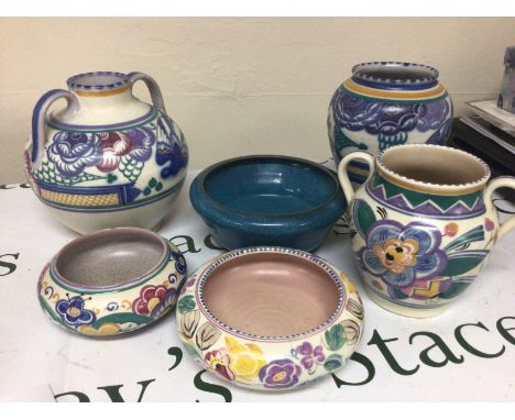 A collection of Poole Pottery Including early Carter Stapler Adam Poole (6) some damage.