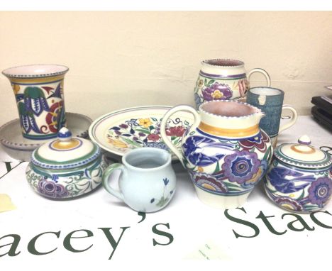 A collection of Poole pottery jugs vases and a dish and a Troika vase (damaged)
