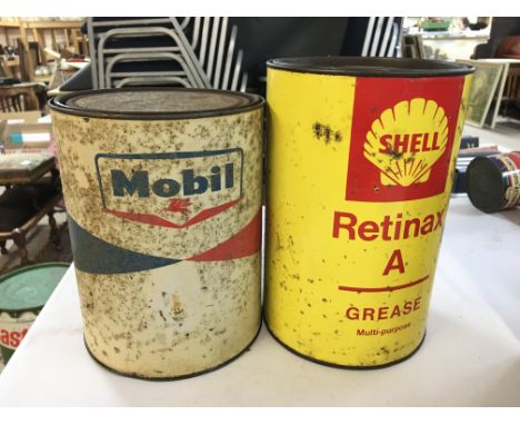 Heavy Mobil full grease can and a Duckhams Admax grease can