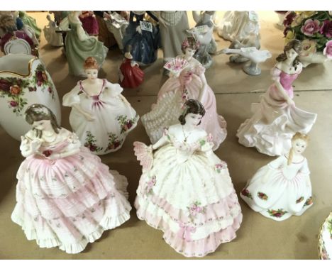 A collection of porcelain figures including Royal Doulton and Coalport. This lot cannot be posted