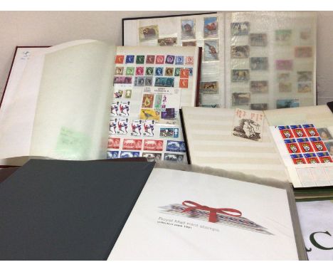 An album containing Royal Mail Year Packs 1991-2002 not complete an album of presentation packs and other stamp albums Britis