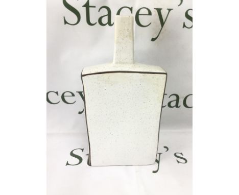 An unusual Troika vase of extended chimney shape in a subdued mottled finish, approx height 32.5cm. Shipping category D.