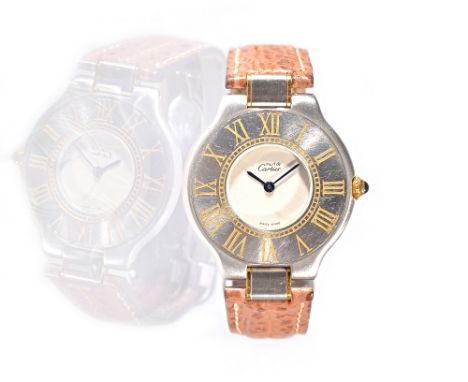 A Must de Cartier 21 steel cased quartz wristwatch, the chapter ring with gilt Roman numerals, the silvered signed dial with 