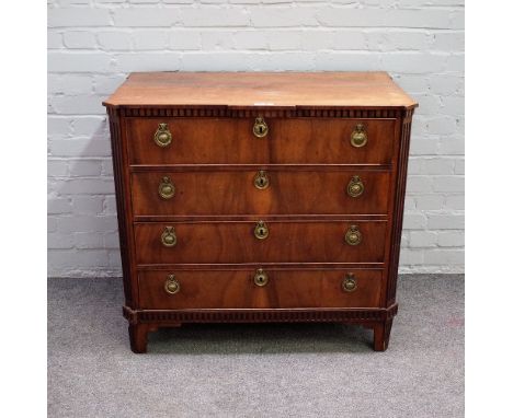 An 18th century Continental walnut four drawer commode with fluted canted corners, 88cm wide x 83cm high. 