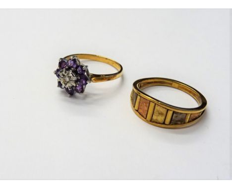 A 9ct gold, amethyst and diamond set nine stone cluster ring, ring size M and a half and a 9ct three colour gold ring, ring s