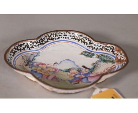 A small Canton enamel European subject quatrelobed dish, Qianlong, enamelled with two figures seated in a landscape, purple p