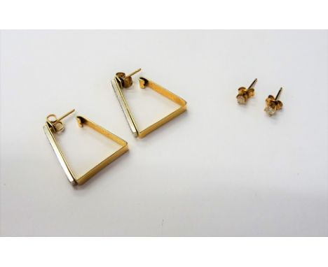 A pair of gold and diamond single stone earstuds, each claw set with a circular cut diamond, the backs with post and butterfl