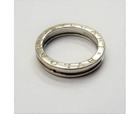 A Bvlgari 18ct white gold band ring, detailed Bvlgari twice to both sides and marked 750 Made In Italy, ring size V, weight 7