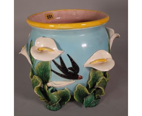 A Victorian style ceramic jardiniere with moulded floral decoration, 23cm wide x 27cm high.  D1
