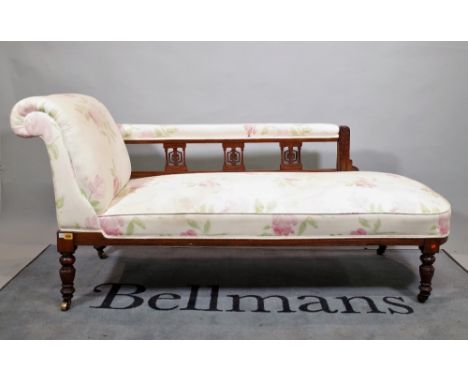 An early 20th century mahogany framed chaise longue, on ring turned supports, 155cm wide x 80cm high.