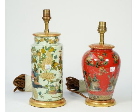 A decolamania vase, 20th century, decorated with Asian figures against a foliate green cylindrical body with giltwood base an