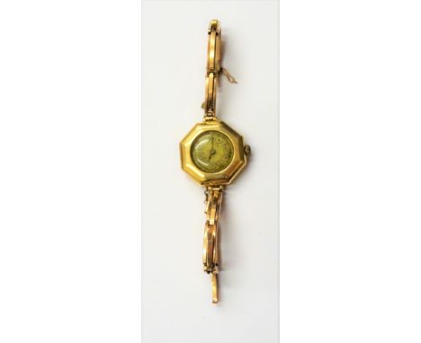 A Rolex gold octagonal cased lady's wristwatch, the jewelled lever movement detailed Rolex 15 Jewels, Swiss Made, the dial wi
