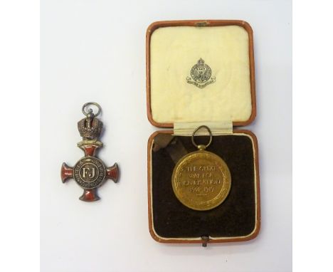 A 1914-19 Victory medal to 39654 T.CPL E.M.HIGGINS. 6-F.A.B. A.I.F., an Austrian silver and red enamelled Order of Franz Jose