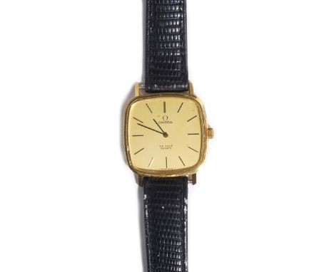 An Omega De Ville Quartz 18ct gold curved square cased gentleman's wristwatch, with a signed movement, the signed gilt dial w