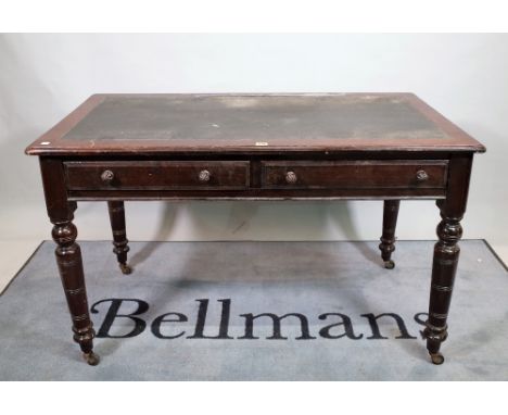 A 19th century mahogany two drawer writing table on ring turned supports, 120cm wide x 75cm high. 