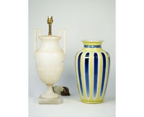 A Chinese style porcelain vase, converted to a table lamp with fluted blue vertical stripes against a yellow and white ground