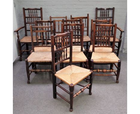 A matched set of eleven 19th century Lancashire bobbin back dining chairs, to include a pair of carvers, (11). 