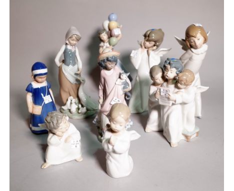 A group of eight Lladro figurines, one Nao figurine and one Royal Copenhagen figure, the largest 26cm high, (10). S3T