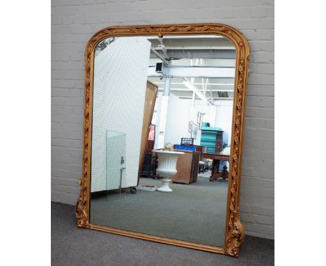 A Victorian gilt framed arch top overmantel mirror, with ribbon tied egg and dart moulding, 145cm wide x 168cm high.