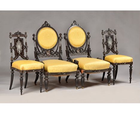 A 19th century ivory marquetry inlaid ebonised salon suite to comprise; open arm sofa, 145cm wide x 110cm high, two armchairs