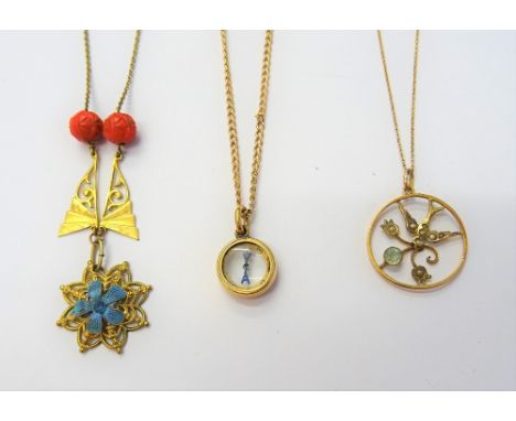 A gold mounted compass pendant, with a gold curb link neckchain, on a cylindrical clasp, a gold, seed pearl and pale blue gem