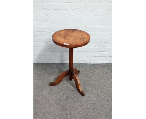 A 19th century provincial French elm and pine circular tripod occasional table, 42cm diameter x 76cm high. 