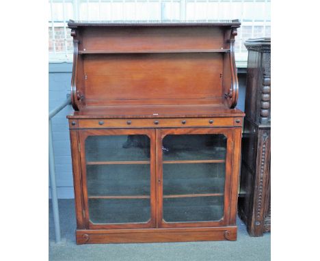 A 19th century mahogany side cabinet, the scroll mounted shelf back over a pair of glazed doors, 127cm wide x 164cm high.