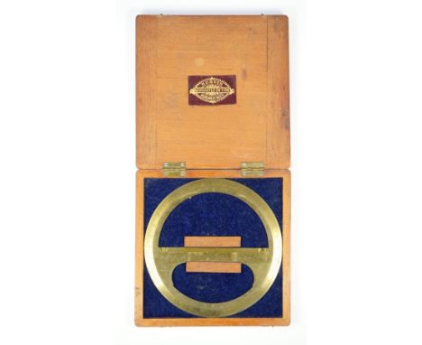 An early 20th century brass circular protractor by 'F. ROBSON, NEWCASTLE UPON TYNE', in a fitted mahogany case. 