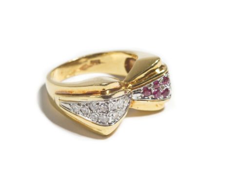 An 18ct gold, diamond and ruby ring, designed as a stylized bow, mounted with circular cut diamonds and rubies, detailed 18 K