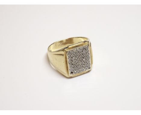 A 9ct gold and diamond set gentleman's rectangular signet style ring, set with circular cut diamonds (one corner diamond lack