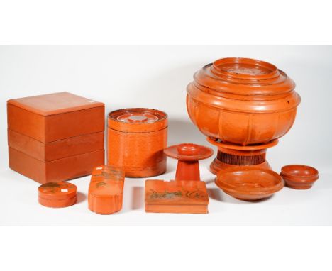 A collection of Chinese red lacquer wares including; a circular candlestick with gilt turtle decoration, 13m high, a large bo