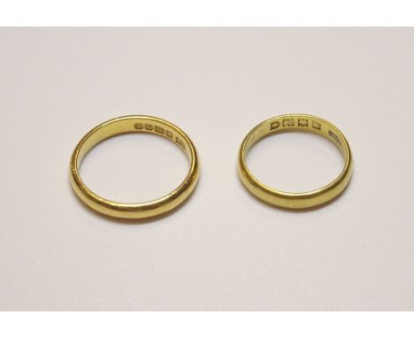 A 22ct gold wedding ring, London 1904, ring size J and a 22ct gold wedding ring, Birmingham 1923, ring size N, combined weigh