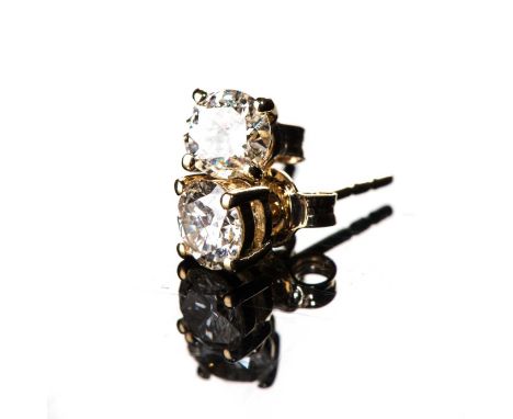 Each claw-set to the centre with a round brilliant-cut diamond, the diamonds weighing approximately 0,88ct in total, approxim