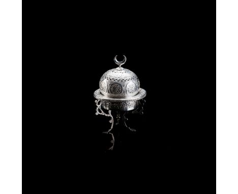 The circular burner with a wide rim, chased and embossed with foliate scrolls, raised on a detachable stand with shaped folia