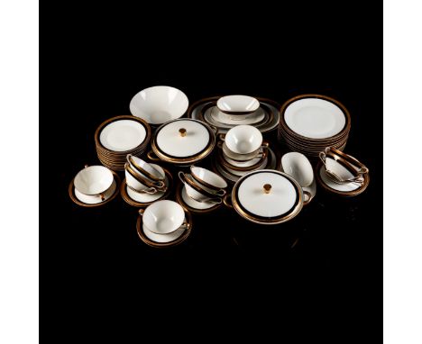 Comprising: 12 dinner plates, 12 side plates, 12 soup coupes and 12 saucers, 2 platters, in sizes, 2 serving dishes and cover