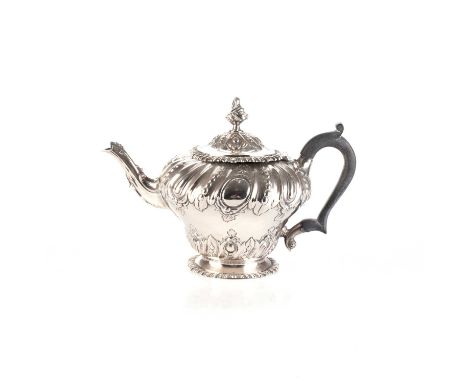 LONDON 1887 The gadrooned and beaded bulbous body with opposing vacant cartouches, the domed hinged cover with gadrooned rim 