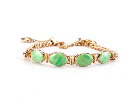 Set with four claw-set cabochon jade stones, on a curb-link chain, with safety chain and two charms, in 18ct goldapproximatel