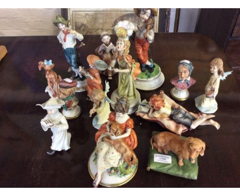Fourteen Capodimonte figurines including girl with dog, boy playing violin, young monk and nun etc.